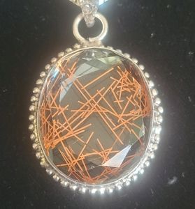 Gorgeous copper rutilated quartz pendant